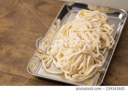 Image of flat, fresh noodles 139383681