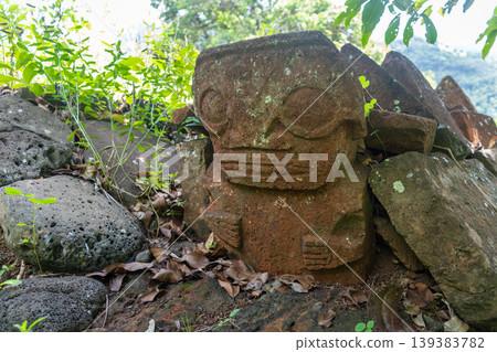 Tiki statue in the old cemetery of Atuona, Hiva Oa, French Polynesia Tiki statue in the old cemetery of Atuona, Hiva Oa, French Polynesia 139383782