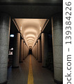 Arched walkway illuminated at night 139384226