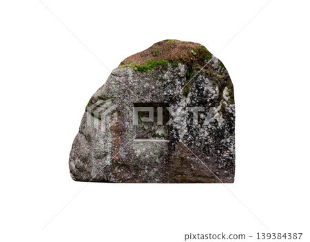 ancient stone with a knocked out depression overgrown with moss isolated on white background 139384387