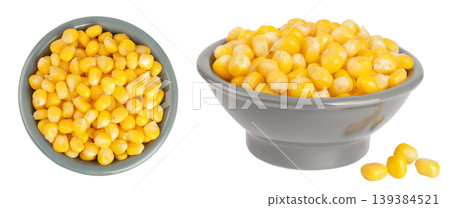 corn seeds in ceramic bowl isolated on white background. Top view. Flat lay corn seeds in ceramic bowl isolated on white background. Top view. Flat lay 139384521