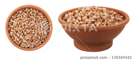 Boiled buckwheat in a ceramic bowl isolated on white background. Top view. Flat lay Boiled buckwheat in a ceramic bowl isolated on white background. Top view. Flat lay 139384582