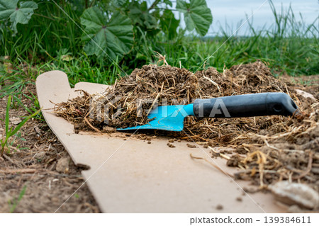 Cardboard in the garden and in permaculture, it provides nutrients and carbon, allows mulching, keeps the soil cool and serves as a method of weeding, brown corrugated cardboard, without ink or glue Cardboard in the garden and in permaculture, it provides nutrients and carbon, allows mulching, keeps the soil cool and serves as a method of weeding, brown corrugated cardboard, without ink or glue 139384611