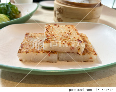 Chinese dim sum, freshly baked radish cake (lo bak go) Chinese dim sum, freshly baked radish cake (lo bak go) 139384648