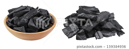Natural charcoal in wooden bowl isolated on white background with full depth of field Natural charcoal in wooden bowl isolated on white background with full depth of field 139384936