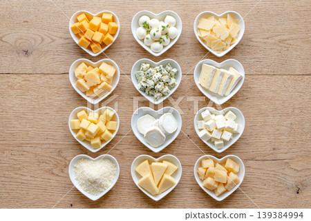 Types of cheese arranged in a heart-shaped dish Types of cheese arranged in a heart-shaped dish 139384994