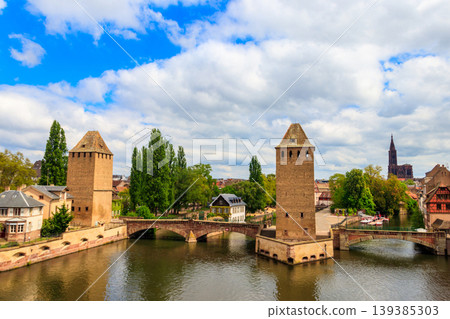 View on medieval bridge Ponts Couverts over the River Ill in Strasbourg, Alsace, France View on medieval bridge Ponts Couverts over the River Ill in Strasbourg, Alsace, France 139385303