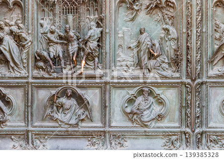 Detail of a bronze door of Milan cathedral, Italy Detail of a bronze door of Milan cathedral, Italy 139385328