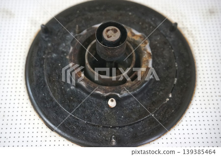 Dirty gas stove before cleaning 139385464