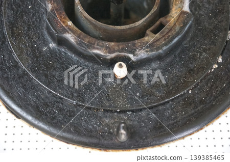 Dirty gas stove before cleaning 139385465
