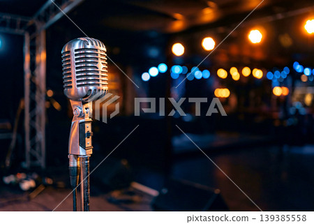 A retro microphone placed on the live stage A retro microphone placed on the live stage 139385558