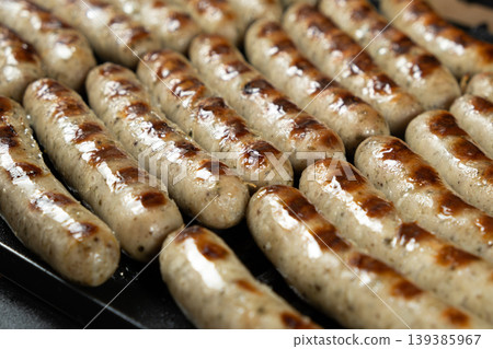 Batch of Sausages Roasting on Modern Electric Home Grill Batch of Sausages Roasting on Modern Electric Home Grill 139385967