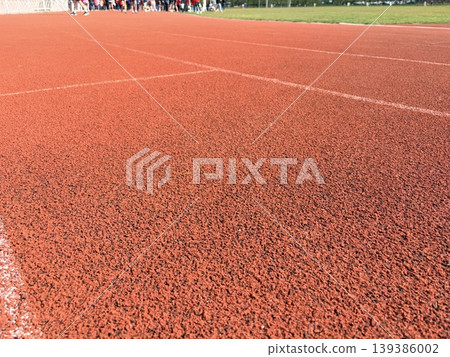 close-up of the ground surface of an outdoor sports stadium. Active life, health care 139386002