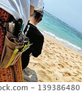 man playing on the beach 139386480