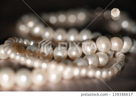 Luxury pearl strands on gray background, elegant jewelry texture. 139386617