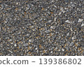 Rough asphalt road surface texture background 139386802