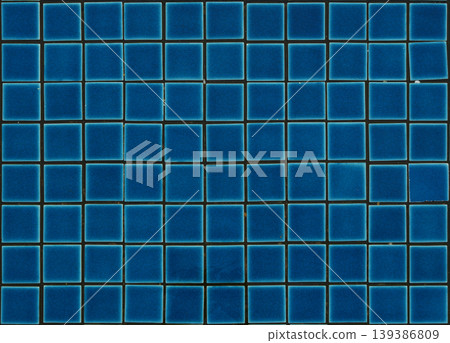 Blue ceramic tile mosaic texture of a swimming pool Blue ceramic tile mosaic texture of a swimming pool 139386809