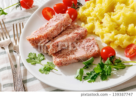 Slices of classic head cheese with mashed potatoes Slices of classic head cheese with mashed potatoes 139387747