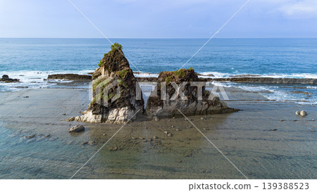 Aerial View of Beautiful Tropical Beach with Unique Rock Formation in Sawarna Indonesia Aerial View of Beautiful Tropical Beach with Unique Rock Formation in Sawarna Indonesia 139388523
