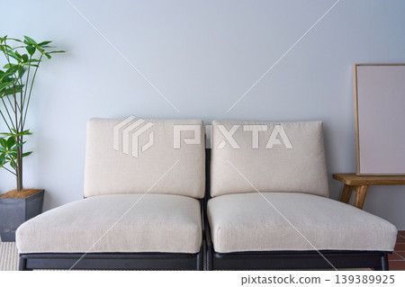 Interior with a sofa by the window Interior with a sofa by the window 139389925
