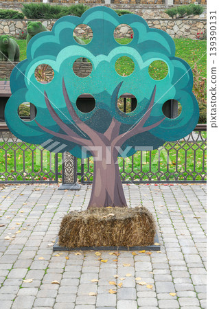 Tree cutout for fun in outdoor activity area Tree cutout for fun in outdoor activity area 139390131