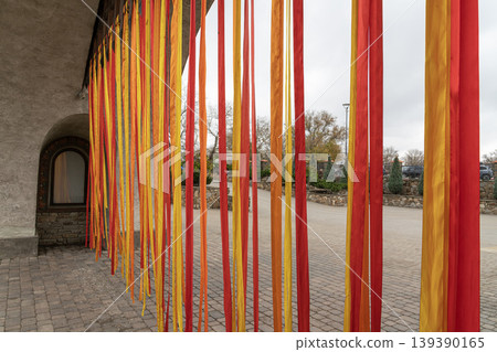 Autumn ribbons drape a stone archway Autumn ribbons drape a stone archway 139390165