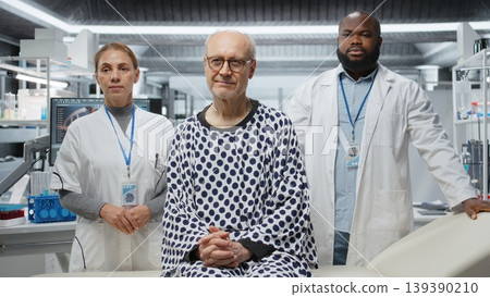 Portrait of medics team and old patient posing in research laboratory, working in modern drug testing for innovation and breakthrough in biomedicine. Senior man and doctors. Camera A. Portrait of medics team and old patient posing in research laboratory, working in modern drug testing for innovation and breakthrough in biomedicine. Senior man and doctors. Camera A. 139390210