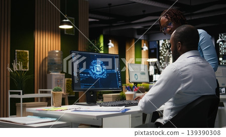 Black colleagues team using AI analytics platform for monthly data reports, reviewing neural networks algorithms and automation for business productivity. IT company representative at work. Black colleagues team using AI analytics platform for monthly data reports, reviewing neural networks algorithms and automation for business productivity. IT company representative at work. 139390308