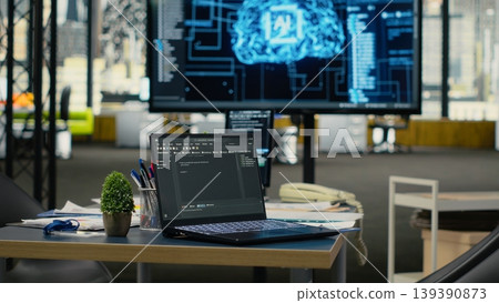 Close up of laptop in empty office used to accelerate complex artificial intelligence calculations. Notebook program used for deep learning training datasets systems, camera B Close up of laptop in empty office used to accelerate complex artificial intelligence calculations. Notebook program used for deep learning training datasets systems, camera B 139390873