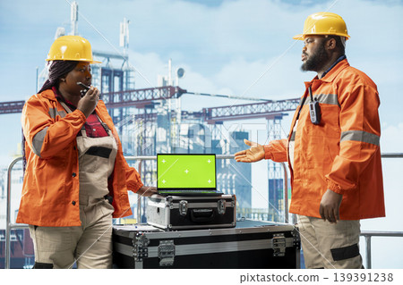 Green screen mockup laptop software used by drilling rig experts for anomaly detection. Offshore platform employees use chroma key notebook device application to control systems remotely Green screen mockup laptop software used by drilling rig experts for anomaly detection. Offshore platform employees use chroma key notebook device application to control systems remotely 139391238