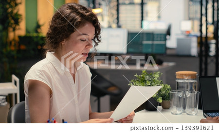 HR manager going over the health insurance and paid time off details, reviewing the salary and package benefits of the employment contract. Female candidate at the job interview. HR manager going over the health insurance and paid time off details, reviewing the salary and package benefits of the employment contract. Female candidate at the job interview. 139391621