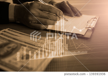 Stock market or forex trading graph and candlestick chart suitable for financial investment concept. Economy trends background for business idea and all art work design. Abstract finance background. Stock market or forex trading graph and candlestick chart suitable for financial investment concept. Economy trends background for business idea and all art work design. Abstract finance background. 139391936