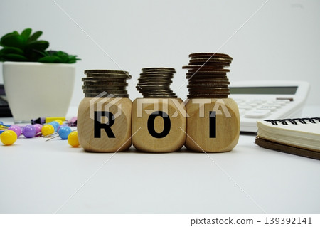 Stack of coins with wood blocks with "ROI (Return on Investment)" Financial concept Stack of coins with wood blocks with "ROI (Return on Investment)" Financial concept 139392141