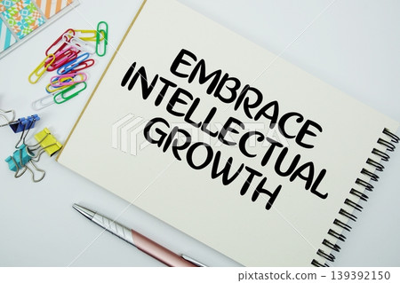 Embrace Intellectual Growth text message written on notepad with stationery flat lay on white background Embrace Intellectual Growth text message written on notepad with stationery flat lay on white background 139392150