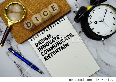 DICE Design, Innovate, Communicate, and Entertain text written on notepad with calculator and magnifying glass on marble background 139392199