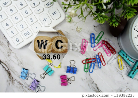 DG (Dynamic Goal) alphabet letters with calculator and alarm clock on marble background DG (Dynamic Goal) alphabet letters with calculator and alarm clock on marble background 139392223