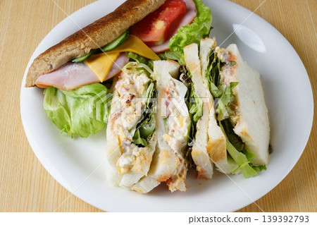 Ham sandwich and egg sandwich 139392793