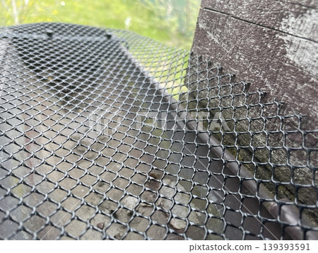 Installing leaf guard mesh in gutter Installing leaf guard mesh in gutter 139393591