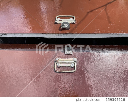 Painting metal sheet with brown enamel coating Painting metal sheet with brown enamel coating 139393626