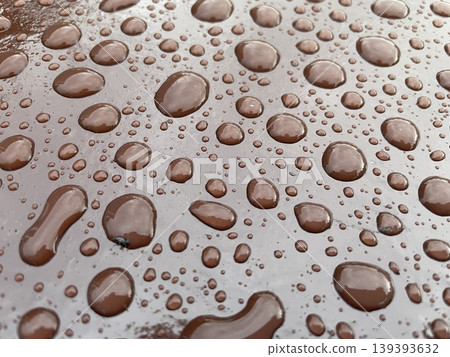 Rain droplets texture on painted metal surface Rain droplets texture on painted metal surface 139393632