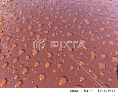 Rain droplets texture on painted metal surface Rain droplets texture on painted metal surface 139393641