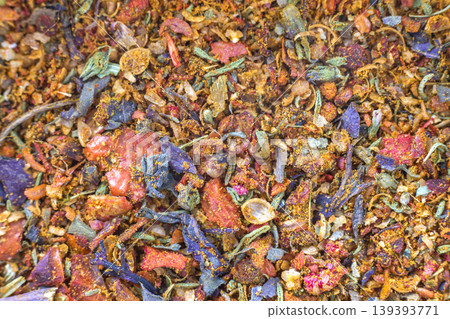 Abstract textured natural bright orange colorful copy space background. Millet, oak, different grains small particles, fish and parrot food. Abstract textured natural bright orange colorful copy space background. Millet, oak, different grains small particles, fish and parrot food. 139393771