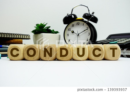 CONDUCT alphabet letters with alarm clock and calculator on white background 139393937