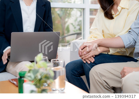 Asian couple therapy counseling and relationship support, mental health, consultation about anxiety. Asian couple therapy counseling and relationship support, mental health, consultation about anxiety. 139394317
