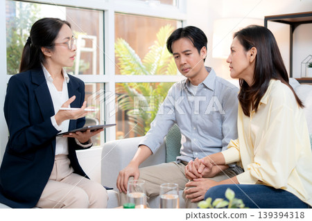 Asian couple therapy counseling and relationship support, mental health, consultation about anxiety. Asian couple therapy counseling and relationship support, mental health, consultation about anxiety. 139394318