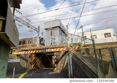 A road (overpass) passing under railway tracks. A road (overpass) passing under railway tracks. 139394366