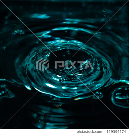 345.Crown Splash and Ripples on Teal-Blue Water Surface 345.Crown Splash and Ripples on Teal-Blue Water Surface 139394574