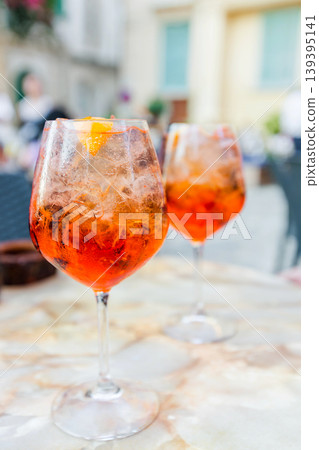 Glass of Aperol Spritz cocktail Glass of Aperol Spritz cocktail 139395141