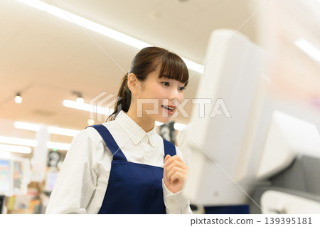 Female staff working at the store Female staff working at the store 139395181