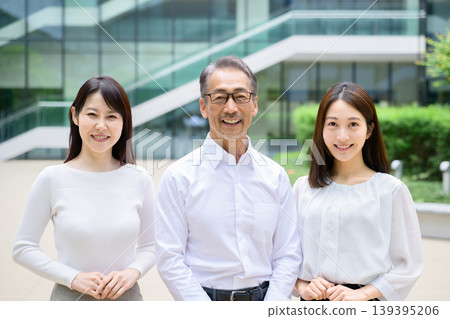 Japanese man and woman looking at the camera outdoors Japanese man and woman looking at the camera outdoors 139395206